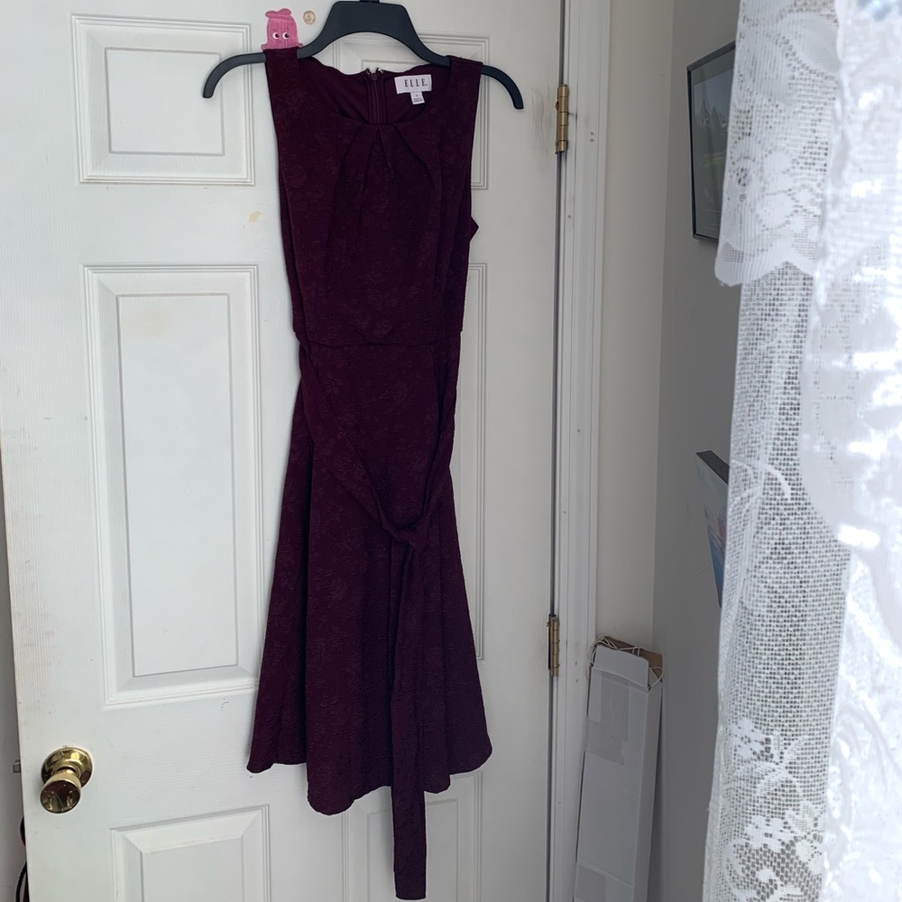 Floral pattern burgundy dress.